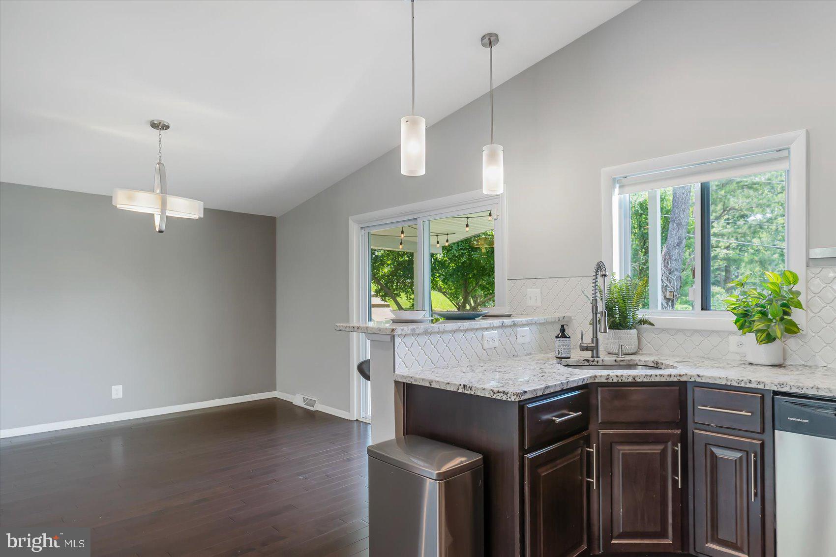 5818 Stuart Avenue Baltimore, MD 21215 - Photo 15 of 64 Kitchen leading to covered rear porch.