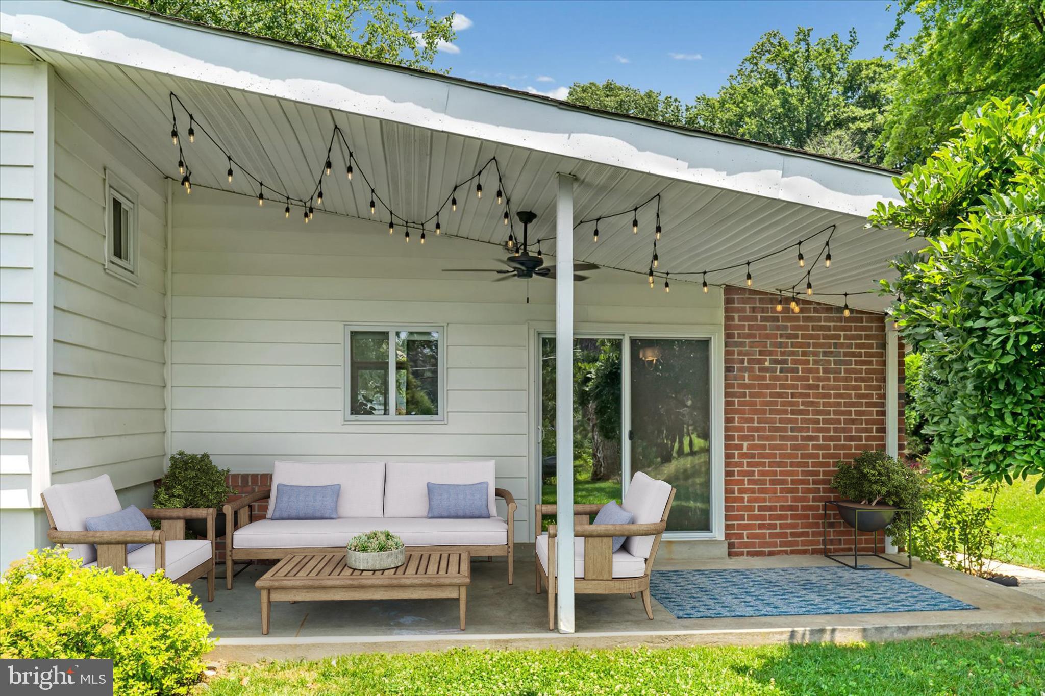 5818 Stuart Avenue Baltimore, MD 21215 - Photo 16 of 64 Large covered porch with sitting and dining area.