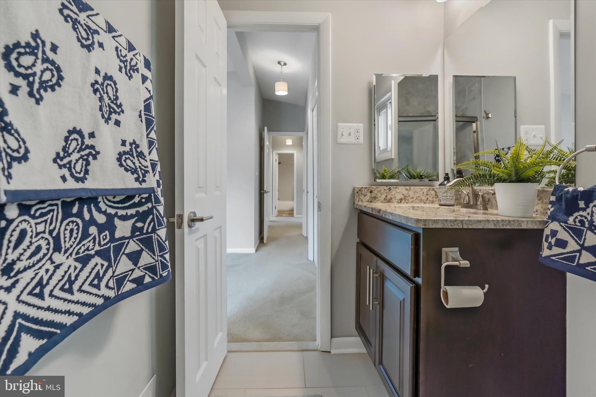 5818 Stuart Avenue Baltimore, MD 21215 - Photo 25 of 64 Remodeled and updated primary bath.