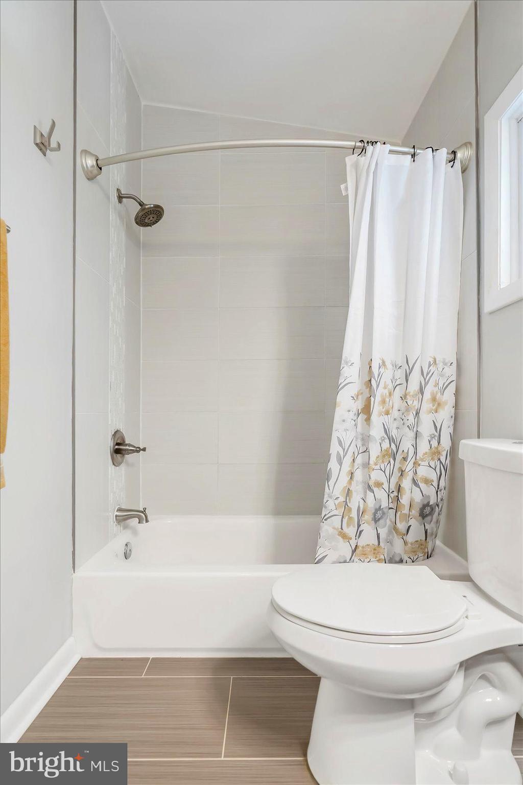 5818 Stuart Avenue Baltimore, MD 21215 - Photo 36 of 64 Remodeled and updated bath on top level.