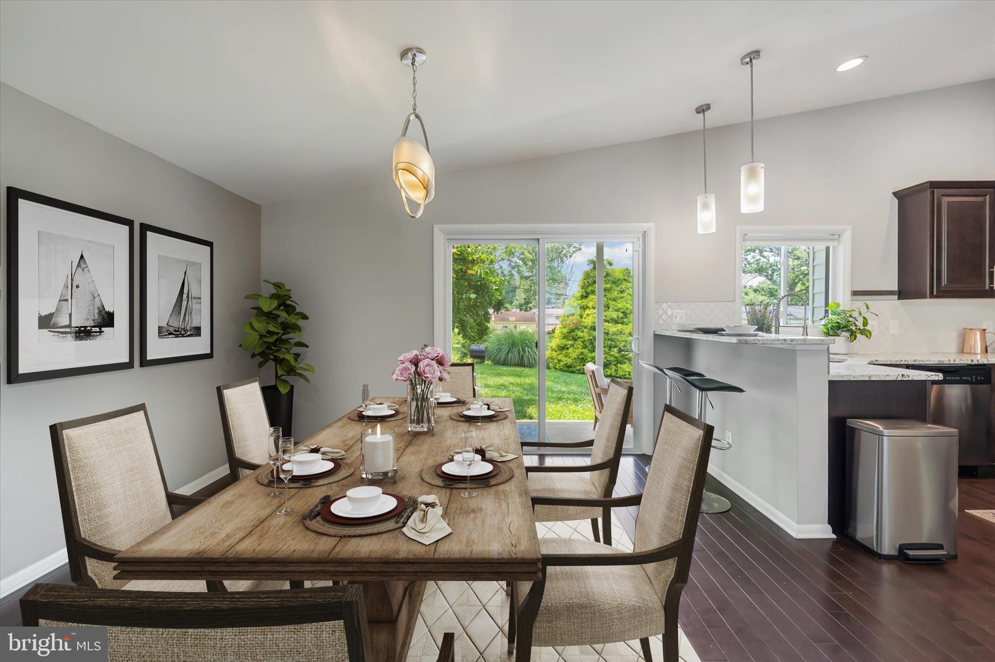5818 Stuart Avenue Baltimore, MD 21215 - Photo 5 of 64 Formal dining area and breakfast bar.