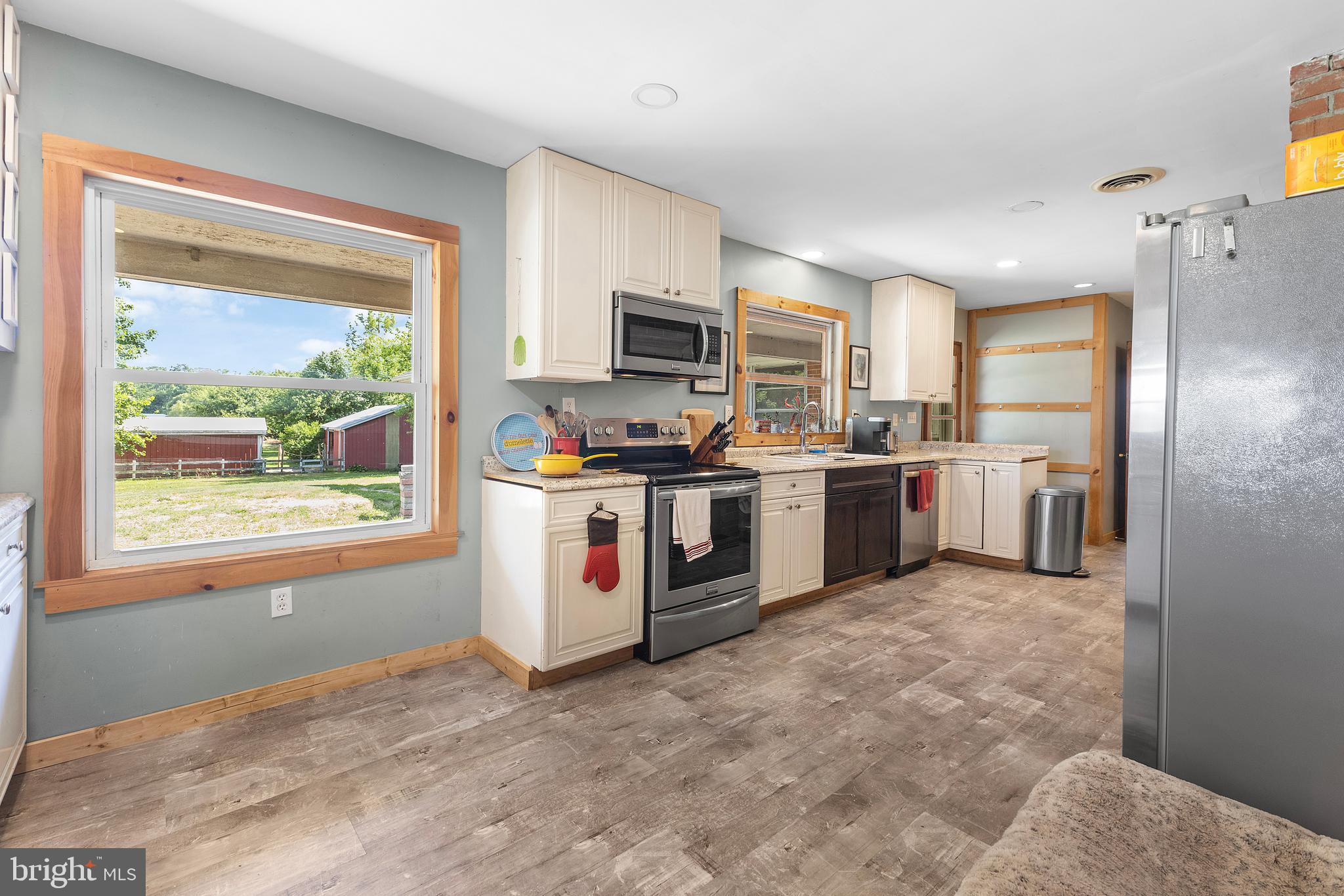 12397 Ridgely Road Ridgely, MD 21660 - Photo 48 of 62 Kitchen with view of yard and barn