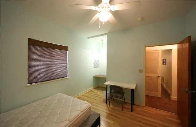 a room with a bed and a table