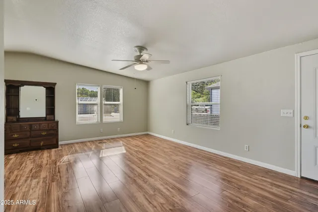 a view of entryway with wooden floor