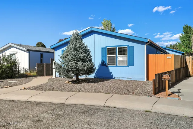 a view of a house with a street