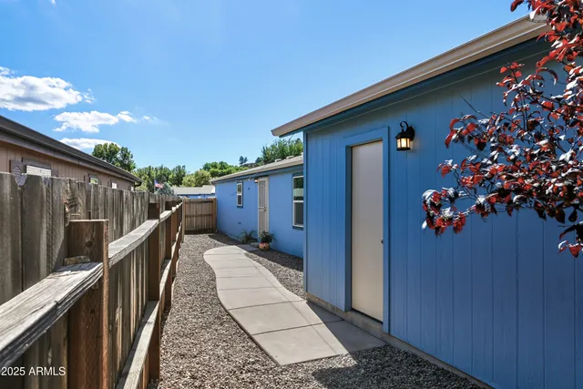 a balcony view with wooden floor and seating space