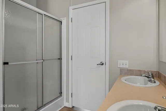 a bathroom with a sink and toilet