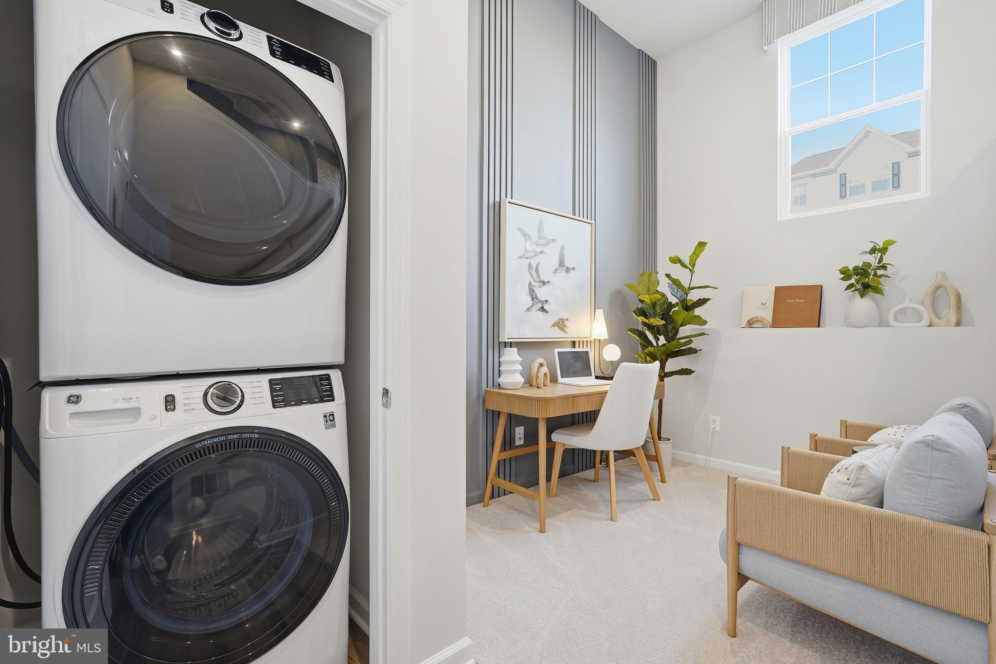 352 Anthem Street, Unit 443 Ranson, WV 25438 - Photo 59 of 87 a living room with furniture and a fireplace