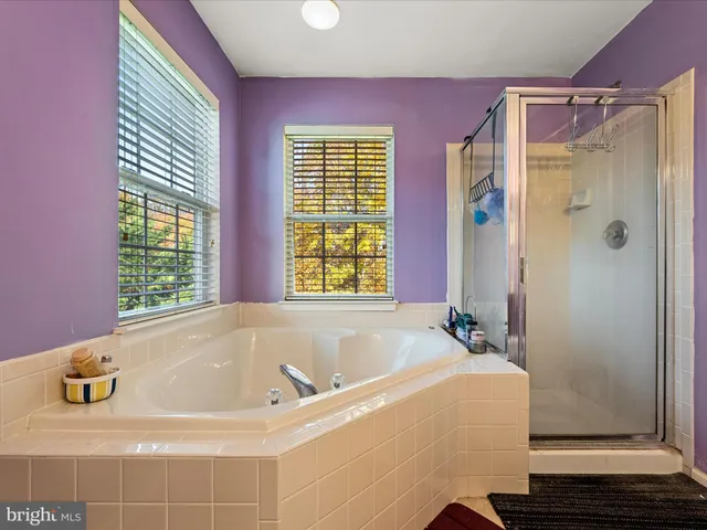 a view of an empty room with stairs