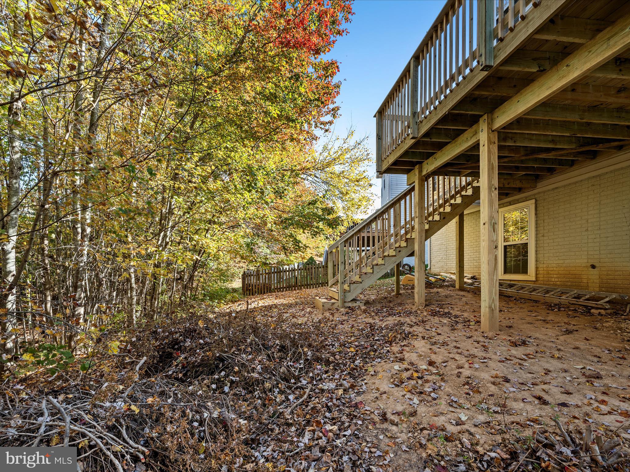 5540 Hobsons Choice Loop Manassas, VA 20112 - Photo 49 of 50 a backyard of a house with lots of green space