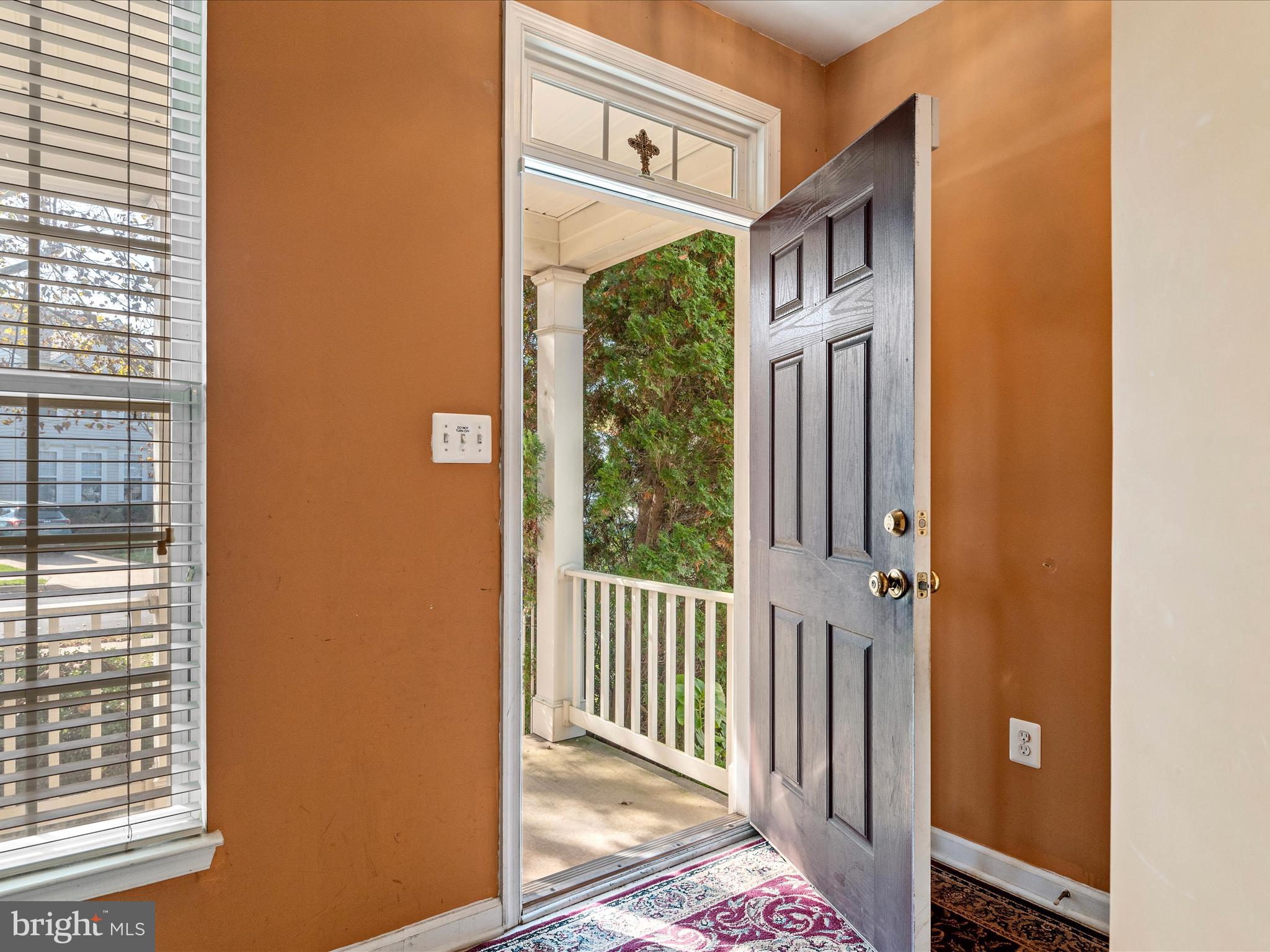 5540 Hobsons Choice Loop Manassas, VA 20112 - Photo 8 of 50 a view of a front door of the house