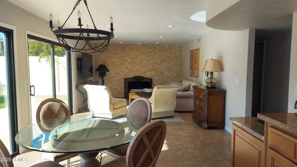 a view of a dining room with furniture window and outside view