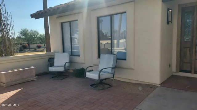 a view of a entryway with a livingroom