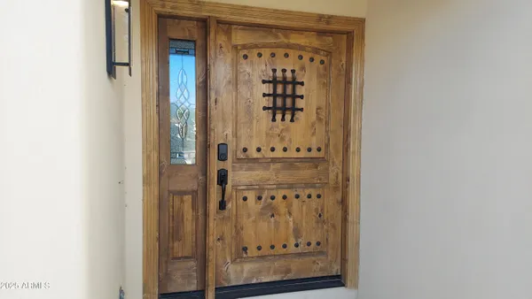 a view of a bathroom with mirror gate