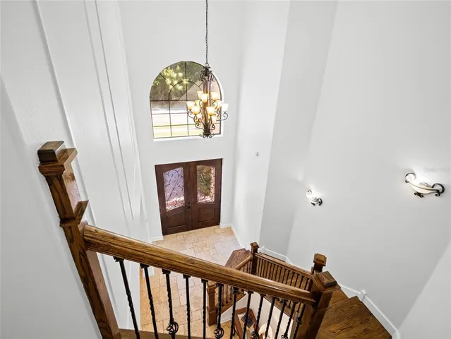 a view of a hallway with windows