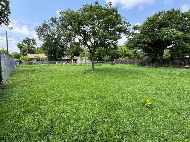 a view of a backyard with a garden