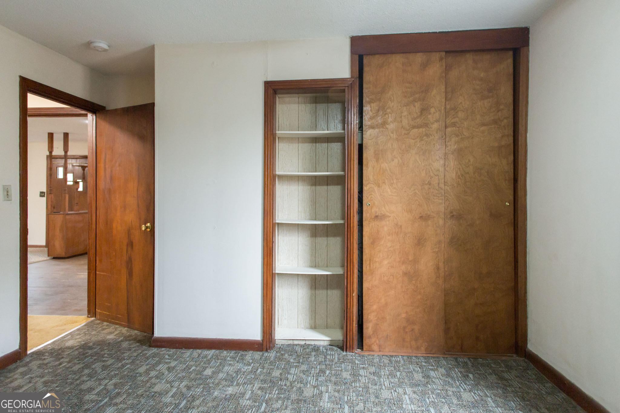 4618 Old Waltertown Road Waycross, GA 31503 - Photo 22 of 39 a view of an empty room and closet area