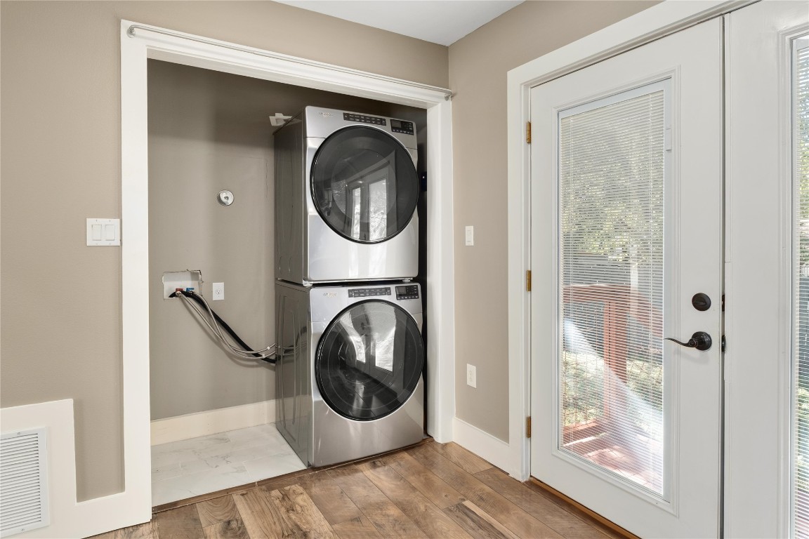 1204 Eleanor Street Austin, TX 78721 - Photo 14 of 27 a view of a hallway with washer and dryer
