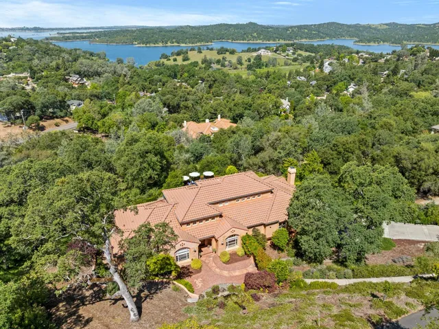 an aerial view of a house with a garden