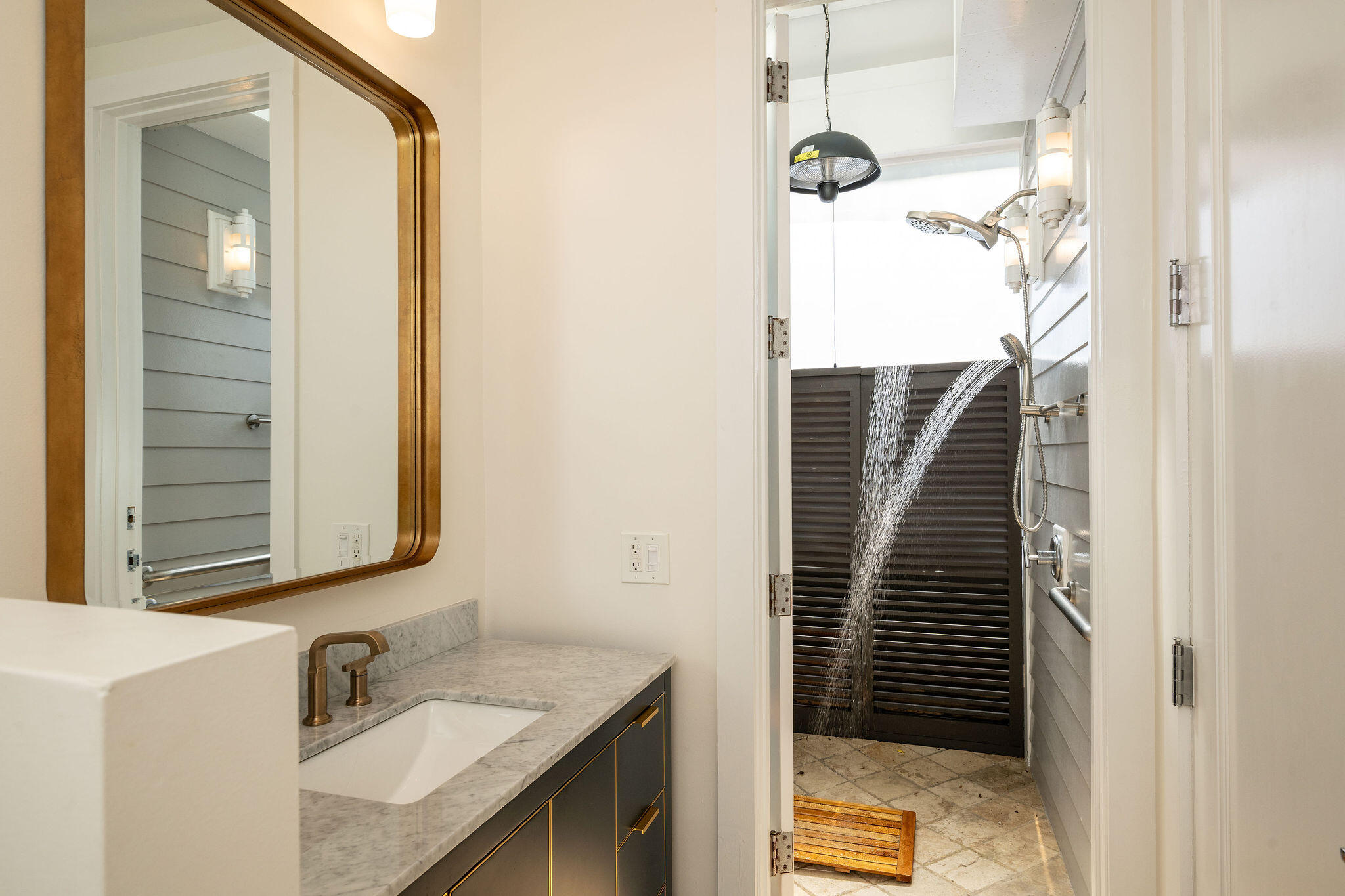 1006-1008 Fleming Street Key West, FL 33040 - Photo 30 of 48 a bathroom with a sink and a mirror