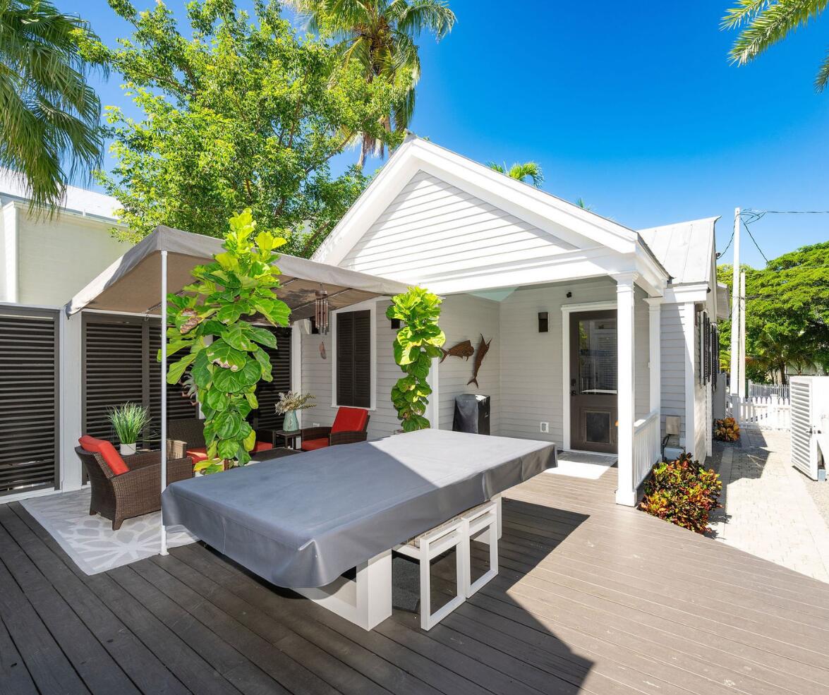 1006-1008 Fleming Street Key West, FL 33040 - Photo 32 of 48 a view of a house with backyard and sitting area