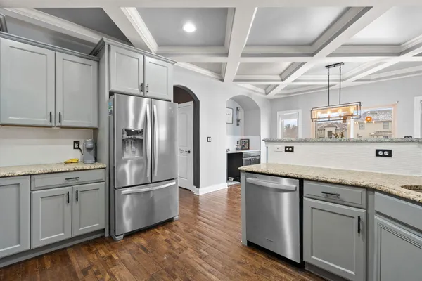 a view of a dining area with furniture and wooden floor