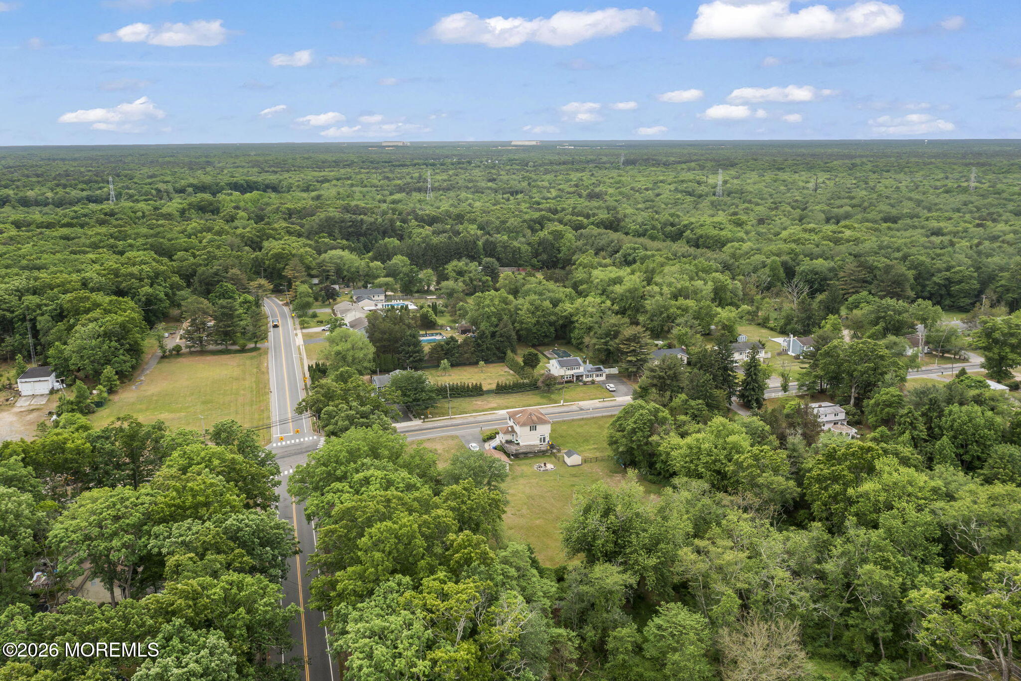 438 Bennetts Mills Road Jackson, NJ 08527 - Photo 39 of 42 a view of a lake with a yard