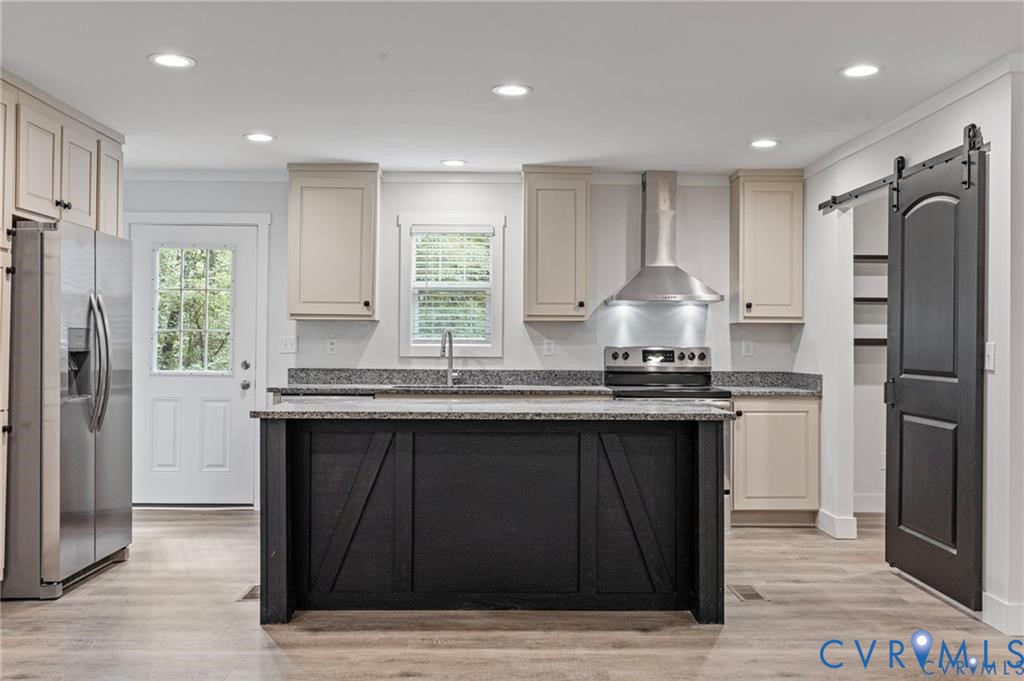 6584 Blenheim Road Powhatan, VA 23139 - Photo 11 of 31 Dual tone kitchen with a barn door, stainless stee