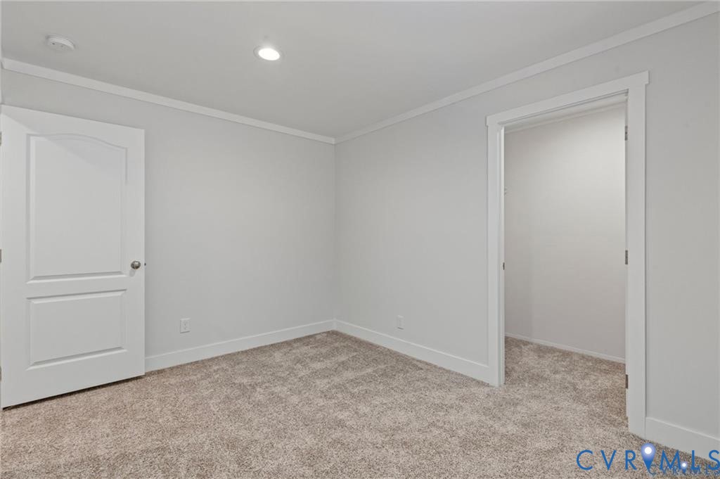 6584 Blenheim Road Powhatan, VA 23139 - Photo 15 of 31 Unfurnished room with ornamental molding, light co