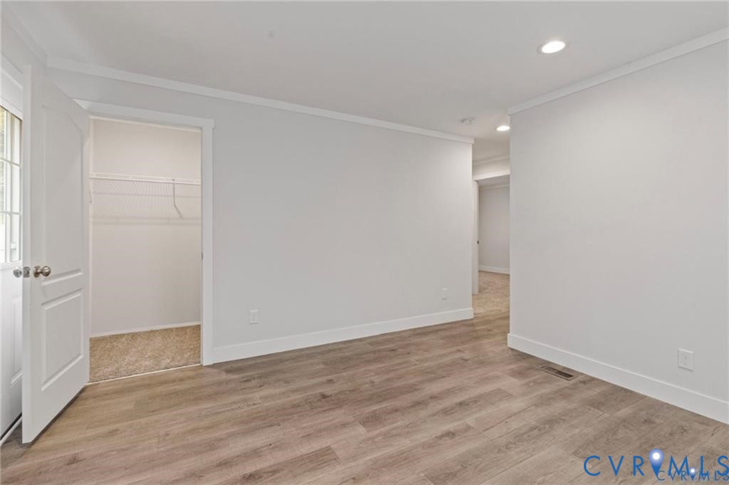 6584 Blenheim Road Powhatan, VA 23139 - Photo 21 of 31 Unfurnished bedroom featuring ornamental molding,