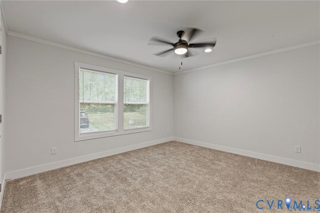 6584 Blenheim Road Powhatan, VA 23139 - Photo 23 of 31 Carpeted empty room featuring ornamental molding a