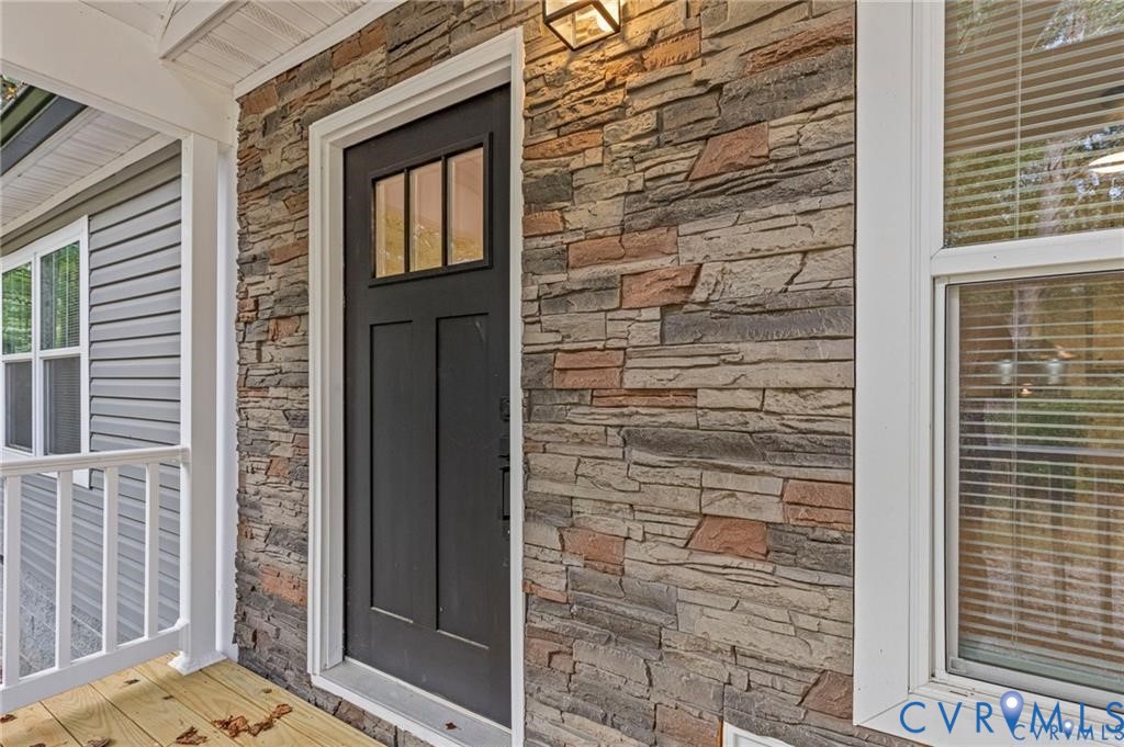 6584 Blenheim Road Powhatan, VA 23139 - Photo 3 of 31 Doorway to property featuring stone siding