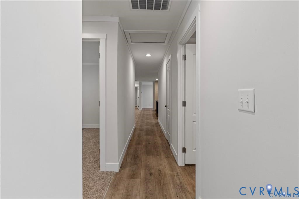 6584 Blenheim Road Powhatan, VA 23139 - Photo 4 of 31 Hall featuring light wood-style floors and recesse