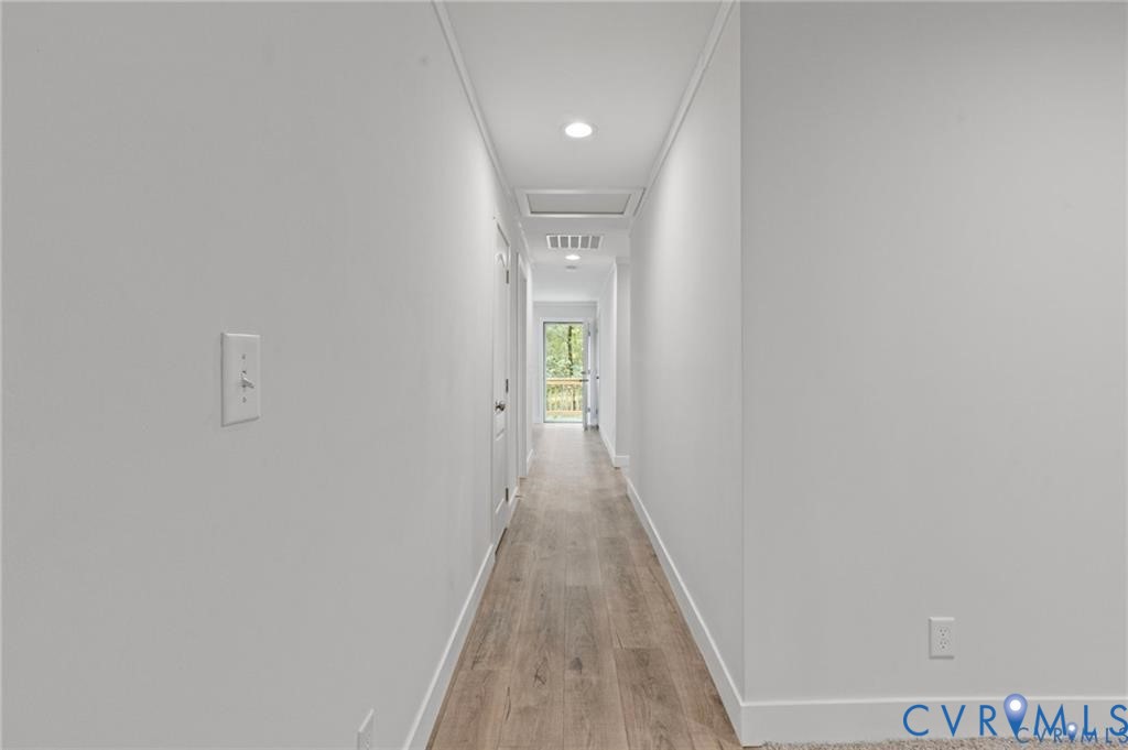 6584 Blenheim Road Powhatan, VA 23139 - Photo 6 of 31 Hallway featuring light wood-style floors, recesse