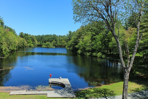 230 Winding Pond Road, Unit 230 Londonderry, NH 03053 - Photo 25 of 30 a view of a lake with outdoor space