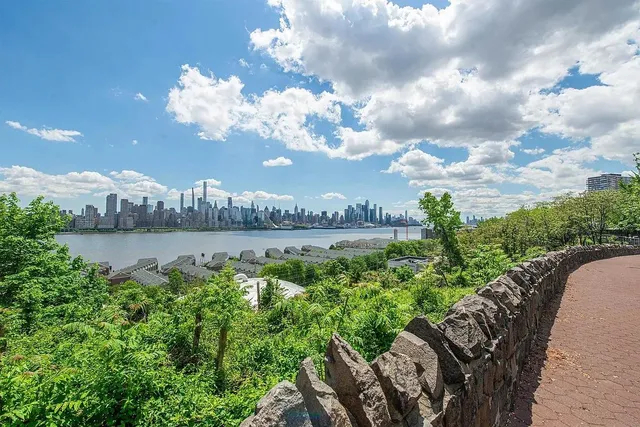 a view of a car parked in front of a house