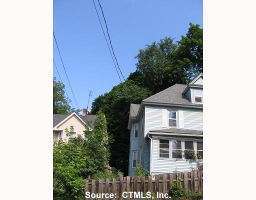 53 Summit Street Manchester, CT 06040 - Photo 1 of 1 a view of a house with a yard