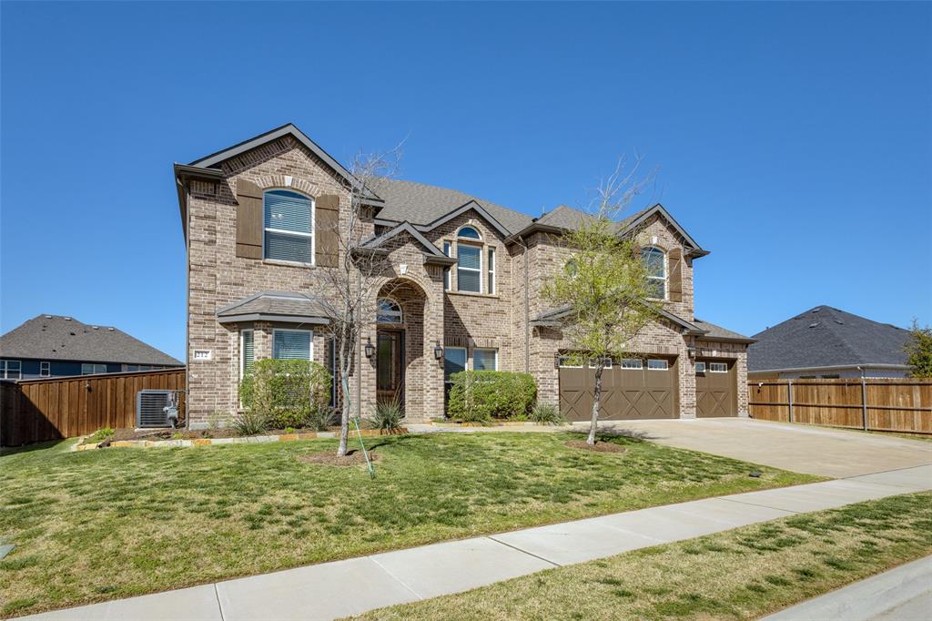 212 Wandering Way Anna, TX 75409 - Photo 2 of 36 front view of a house with a yard
