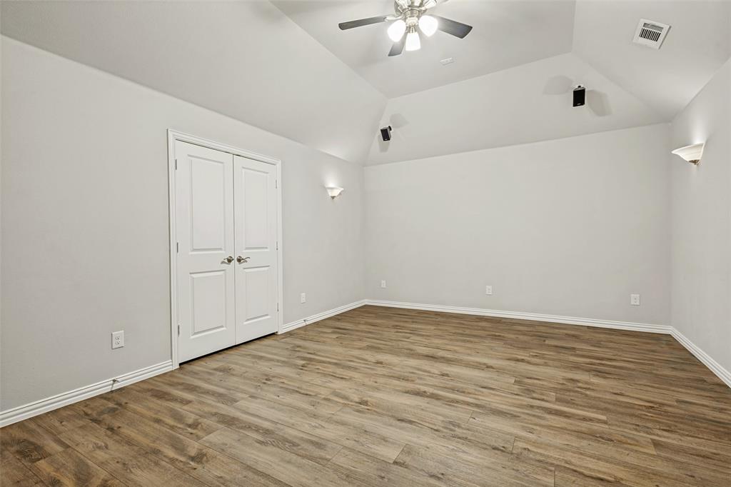 212 Wandering Way Anna, TX 75409 - Photo 22 of 36 wooden floor in an empty room