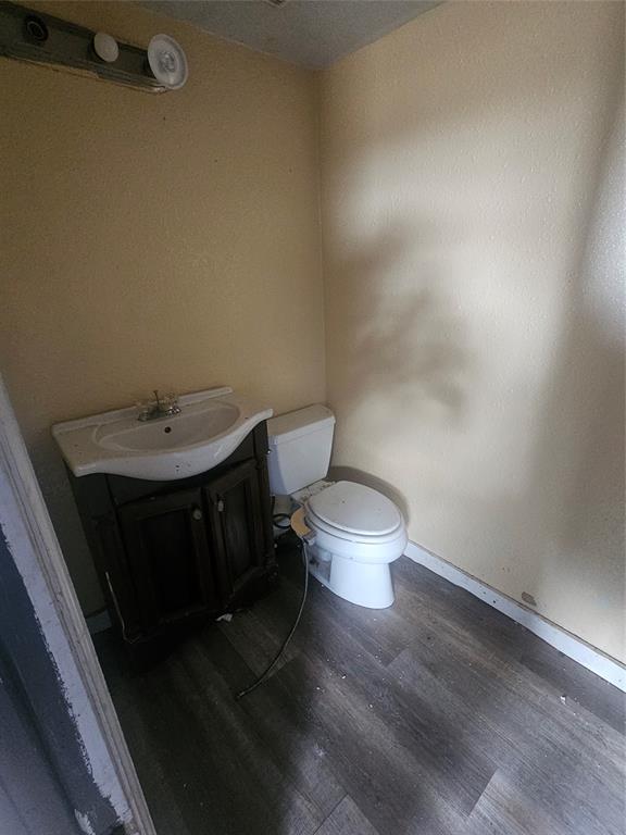 59 Private Road Brookston, TX 75421 - Photo 4 of 6 a bathroom with a sink and a toilet