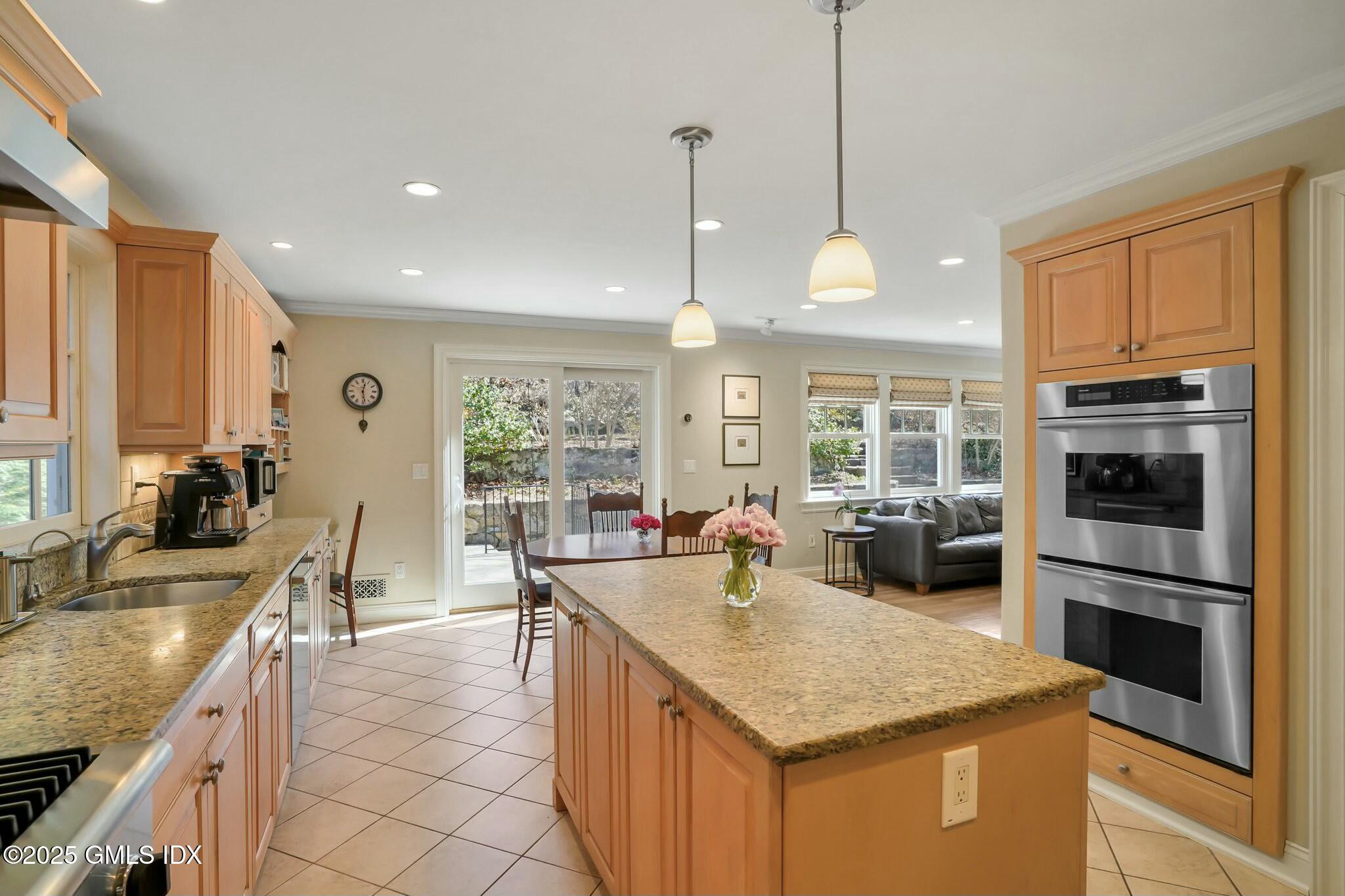 71 Valleywood Road Cos Cob, CT 06807 - Photo 7 of 35 kitchen facing patio