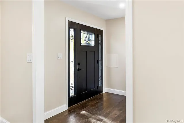a view of balcony with wooden floor and fence