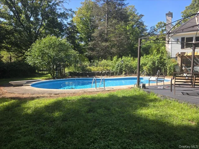 a view of a yard with an outdoor space