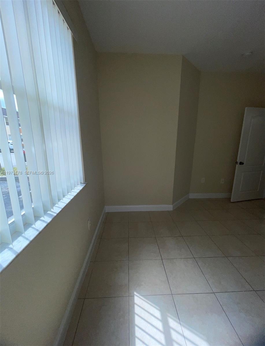 1661 Southeast 29th Court, Unit 109 Homestead, FL 33035 - Photo 14 of 18 a view of a small space
