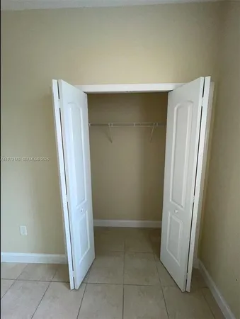 a view of room with front door