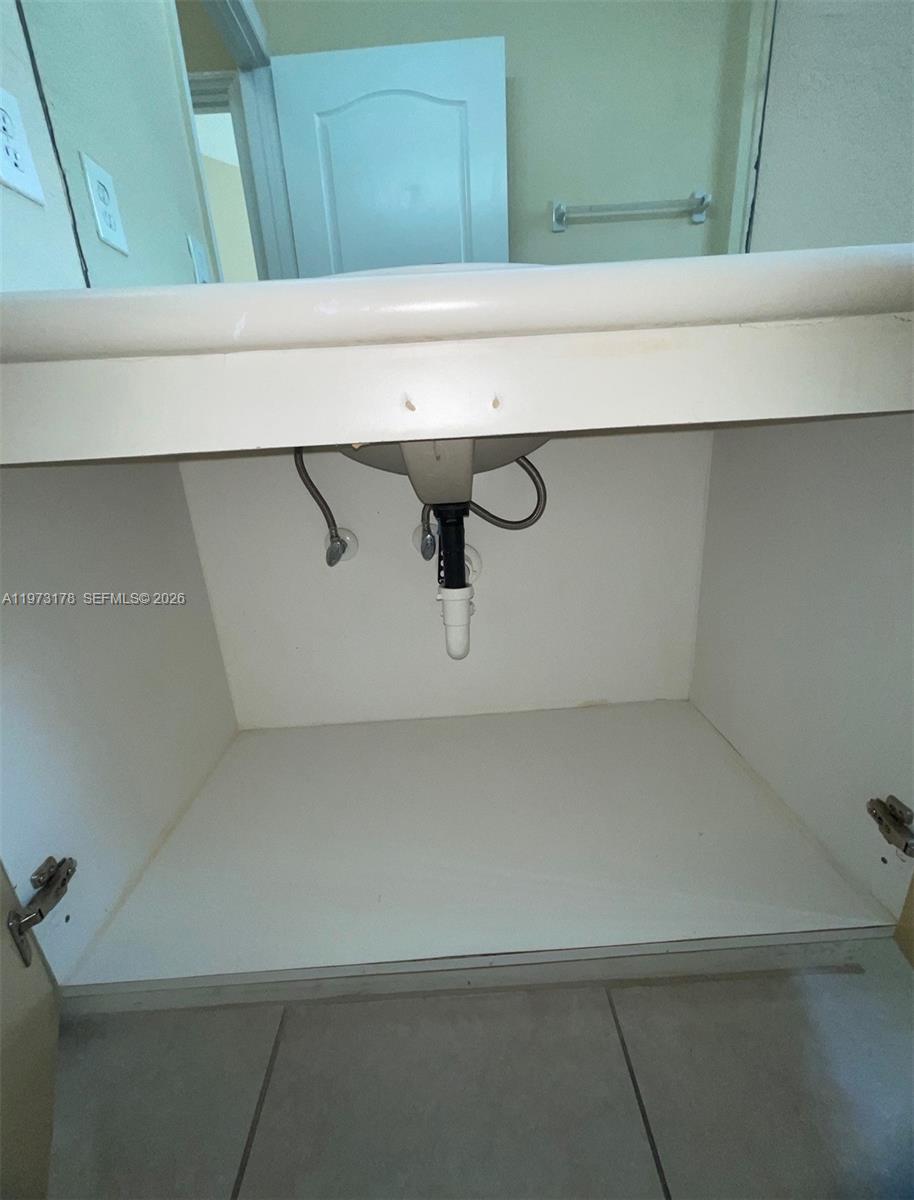 1661 Southeast 29th Court, Unit 109 Homestead, FL 33035 - Photo 10 of 18 a close view of sink