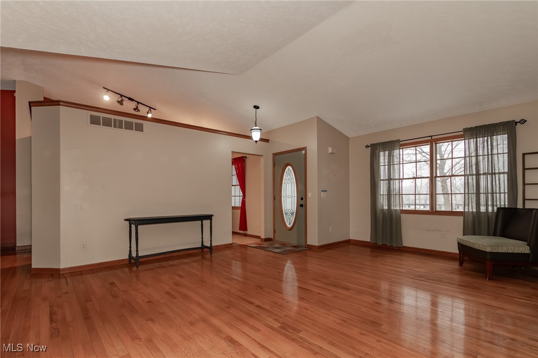 4815 South Ridge Road Perry, OH 44081 - Photo 23 of 48 Foyer with light wood finished floors and lofted ceiling