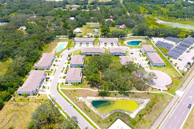 a view of swimming pool with outdoor seating and yard