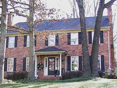 4113 Cresthill Road Chester, VA 23831 - Photo 1 of 1 front view of a brick house with a yard