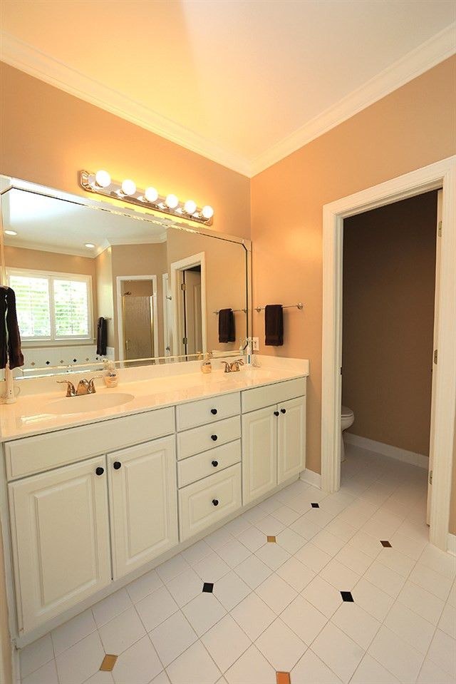 5800 Valley Mist Court Raleigh, NC 27613 - Photo 20 of 30 Ceramic floor, double vanity, large beautiful mirror Master Bath/Spa